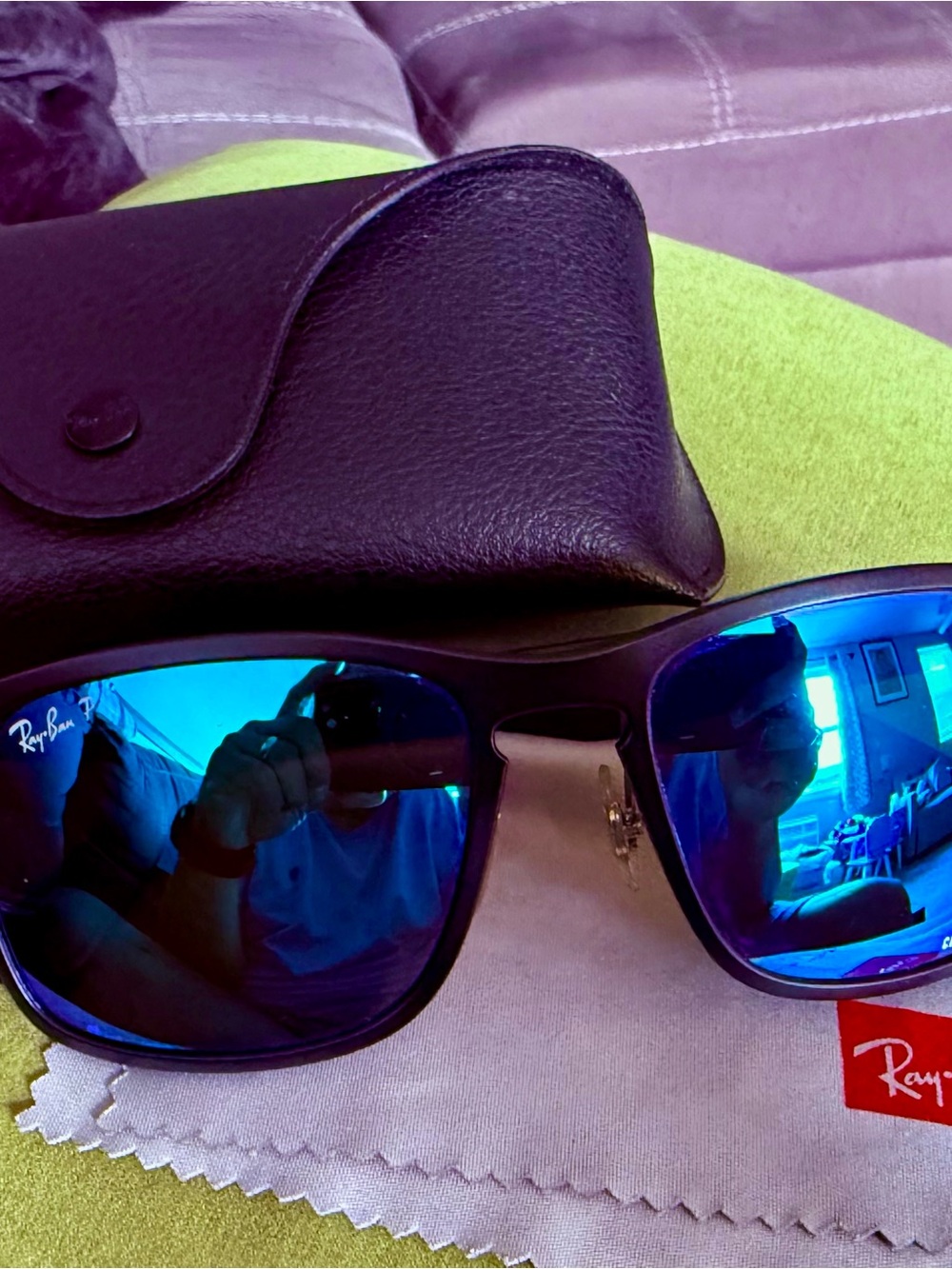 Ray-Ban Black Frame Sunglasses with Blue Mirrored Lenses